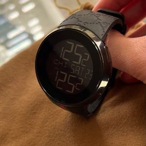 Men’s Gucci watch with Black GG band